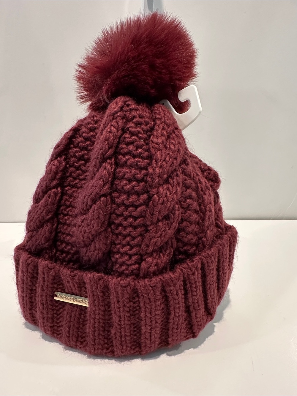 NWT Michael Michael Kors Winter Beanie with Pompom at the top.